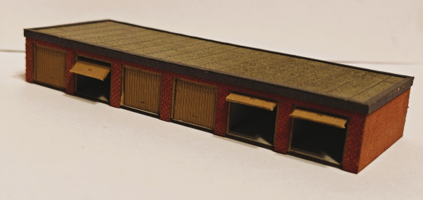 Garagenanlage mit 6 Garagen, Steinfassaden